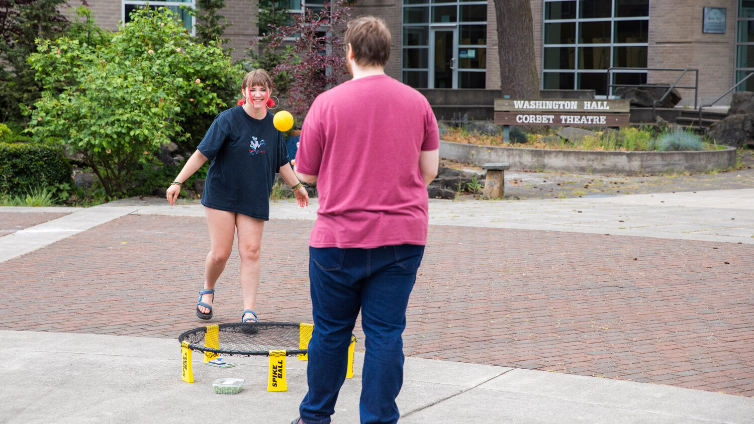 Charlotte Watteyne smiles while playing Spike Ball with Patrick Clark during Spring Fest at Centralia College on Tuesday, May 23.