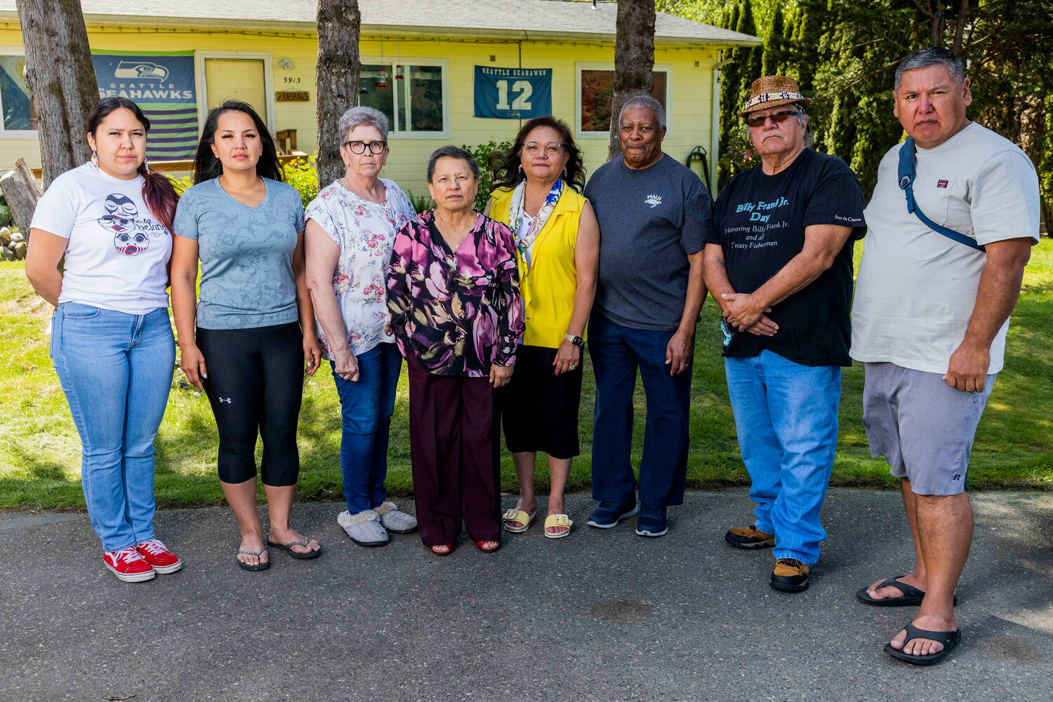 Some of those fighting eviction by the Nooksack Indian Tribe and their supporters are Santana Rabang, left, Rachel Rabang, Billie Rabang, Norma Aldredge, Michelle Roberts, Eugene Aldredge, George Adams and Richard Gladstone. (Daniel Kim/The Seattle Times/TNS)