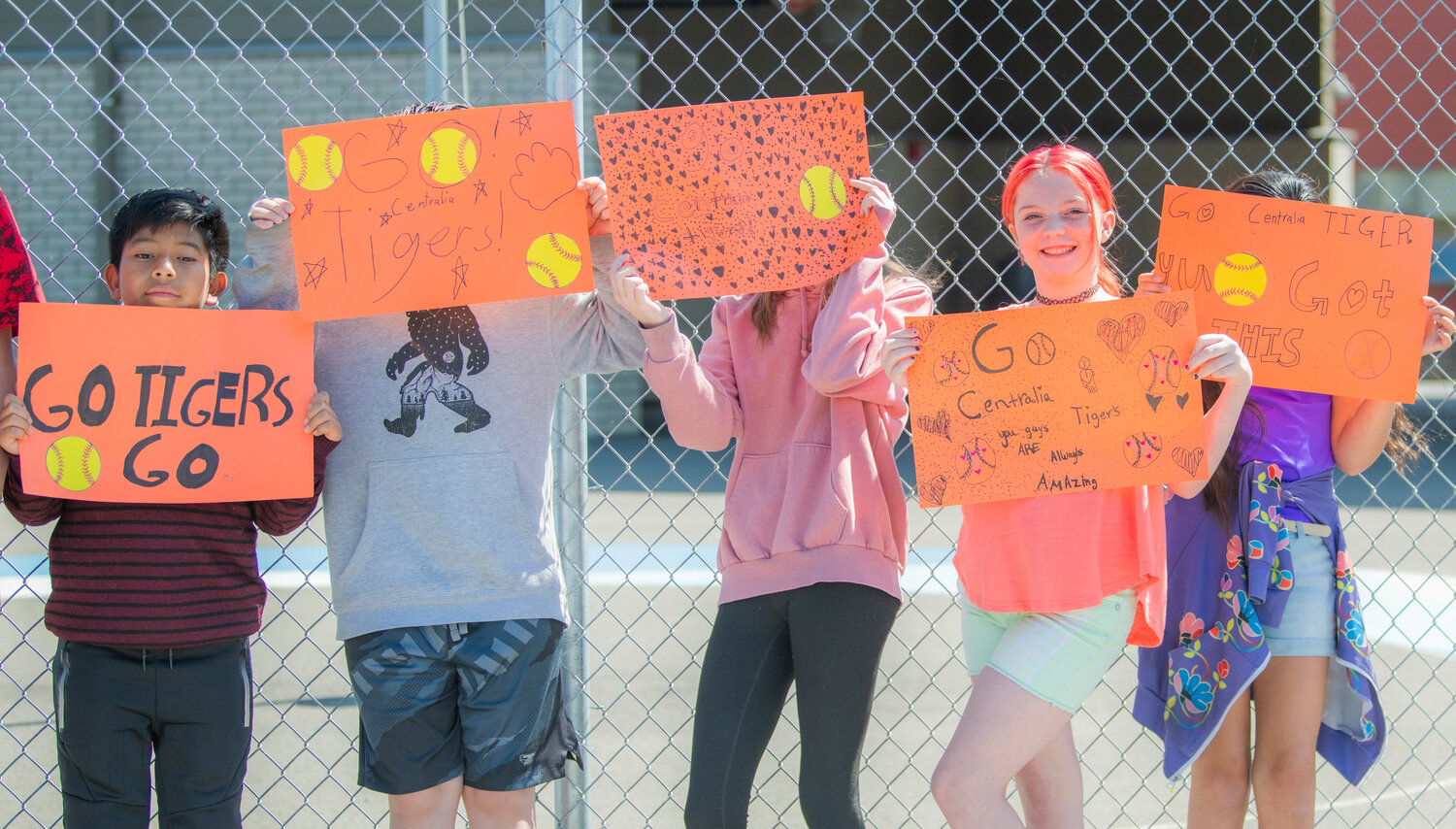 Students at Centralia’s Fords Prairie Elementary School celebrate the state-bound softball team during a send-off procession on Thursday morning.