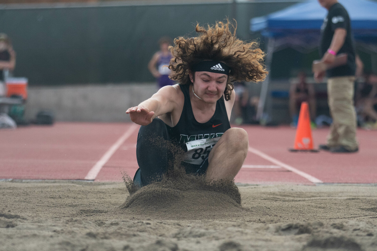 MWP's Max Lowe hits the sand during the triple jump at the 2B state championships at Zaepfel Stadium in Yakima on May 25.