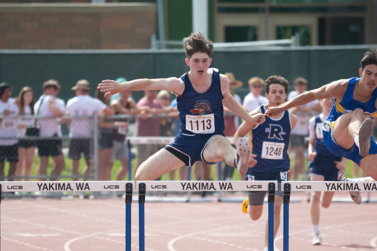 Pe Ell's Carter Phelps gets up during his preliminary heat in the 300-meter hurdles at the 1B state championships at Zaepfel Stadium in Yakima on May 25.. Phelps won his heat to move on to the title race.