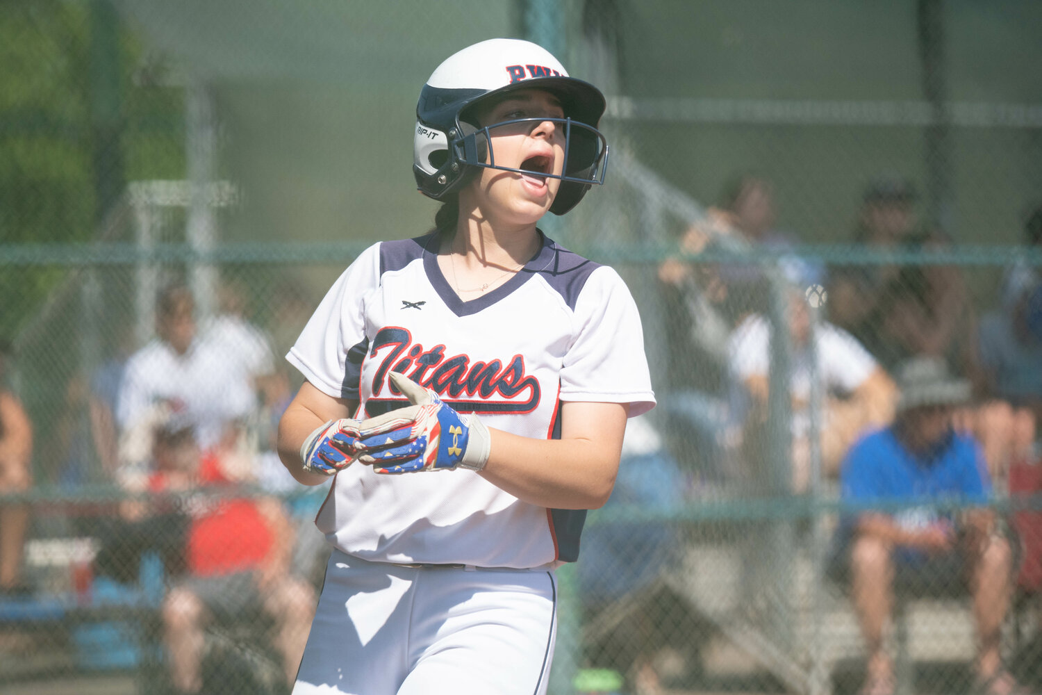 Lorelei Smaciarz celebrates after scoring PWV's second run in its loser-out game against Warden, May 27 in Yakima.