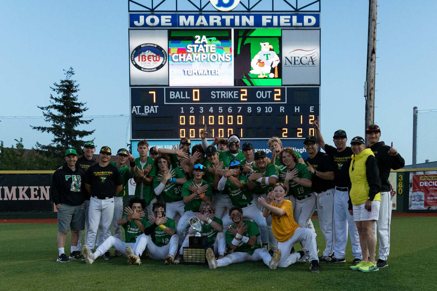 The Tumwater baseball team poses with the first-place trophy after a 2-1 win in the 2A state title against Lynden at Joe Martin Stadium in Bellingham May 27.
