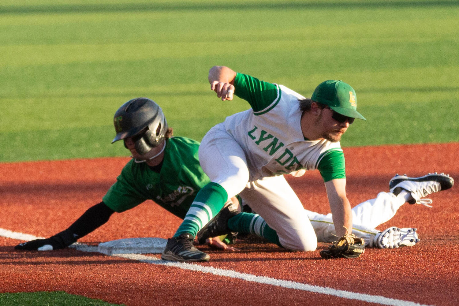 Tumwater's Brayden Oram slides into third base safely against Lynden in the 2A state title game at Joe Martin Stadium in Bellingham May 27.