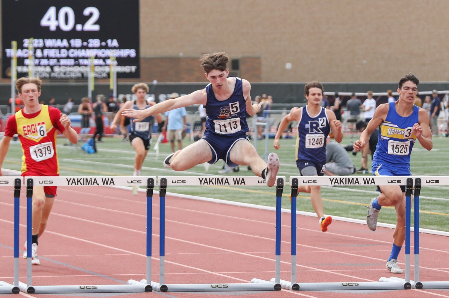 Pe Ell's Carter Phelps takes second in the 300-meter hurdles at the 1B state championships, May 27 in Yakima.