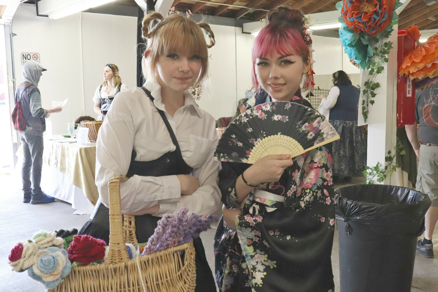 Kay and Alexis Thompson pose for a photo in costume during the Centralia Fantasy Festival at the Southwest Washington Fairgrounds in Chehalis on Saturday, May 27.