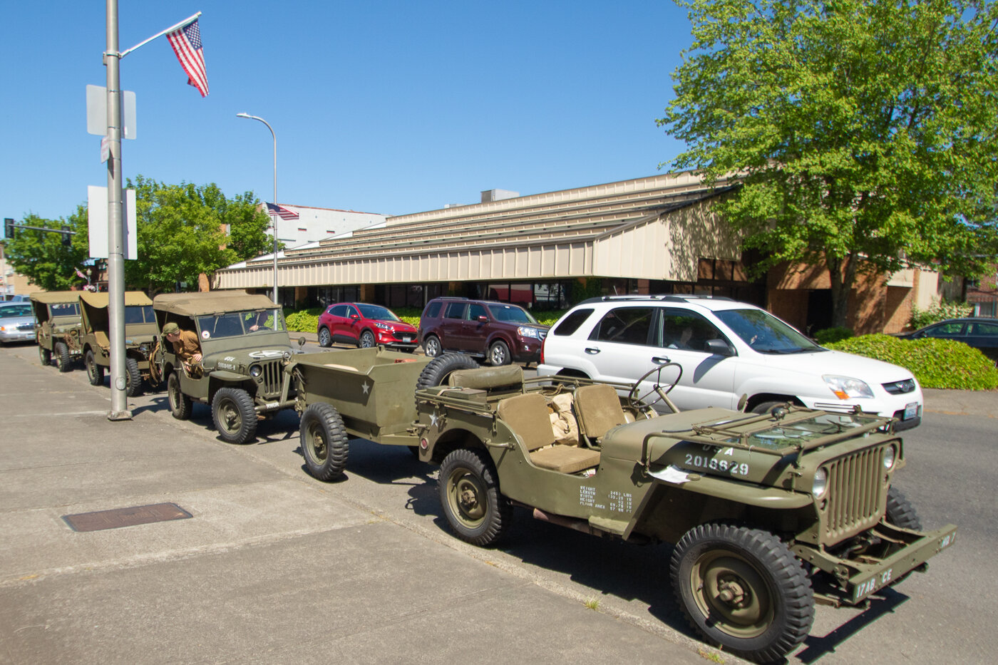 World War II era Jeeps from America's Team Museum in Centralia sit parked on display at George Washington Park on Monday for a Memorial Day ceremony.