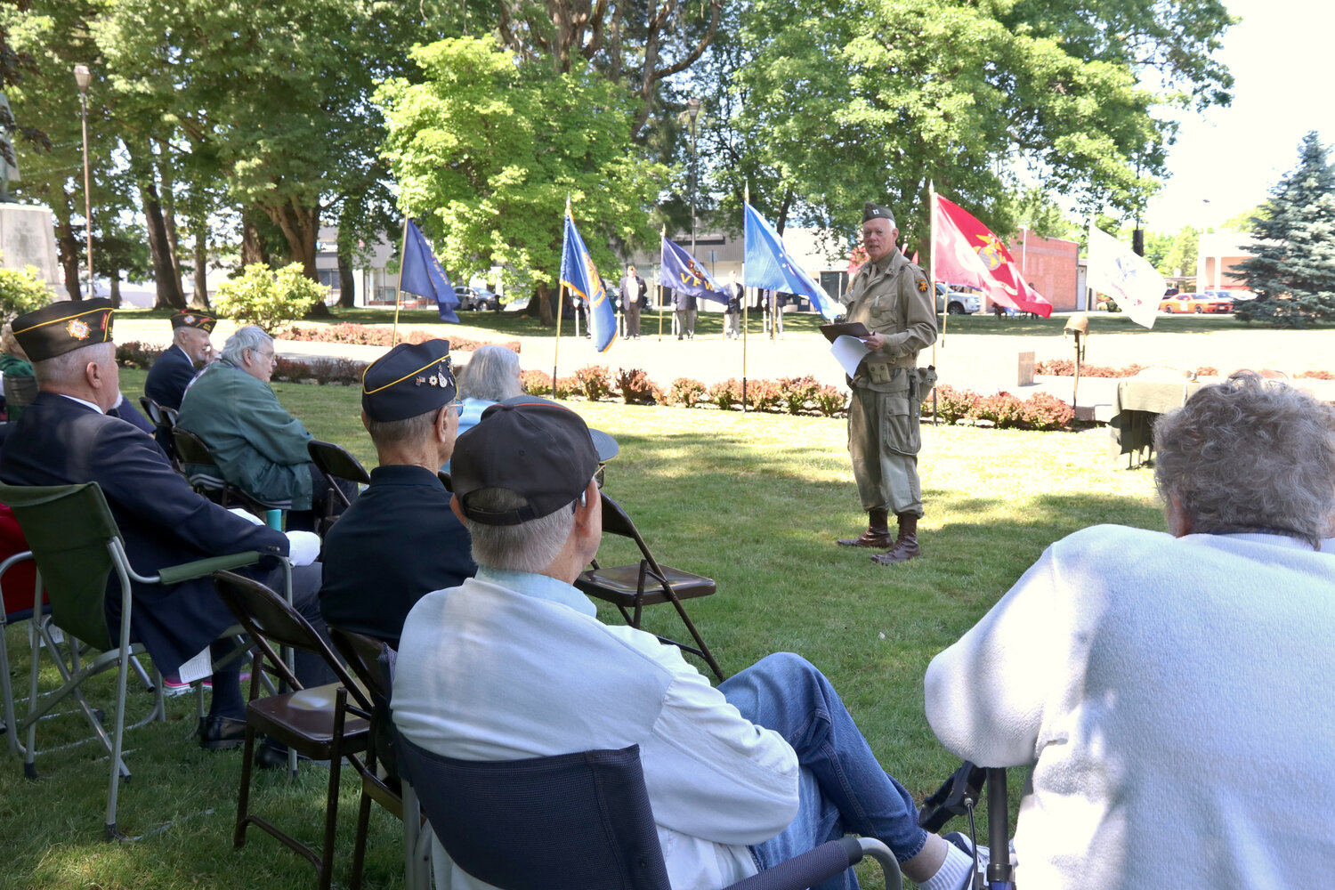 Lewis County Historical Society President Peter Lahmann speaks to attendees of a Memorial Day ceremony at George Washington Park in Centralia Monday. Lahmann is also the owner of America’s Team Museum in downtown Centralia.
