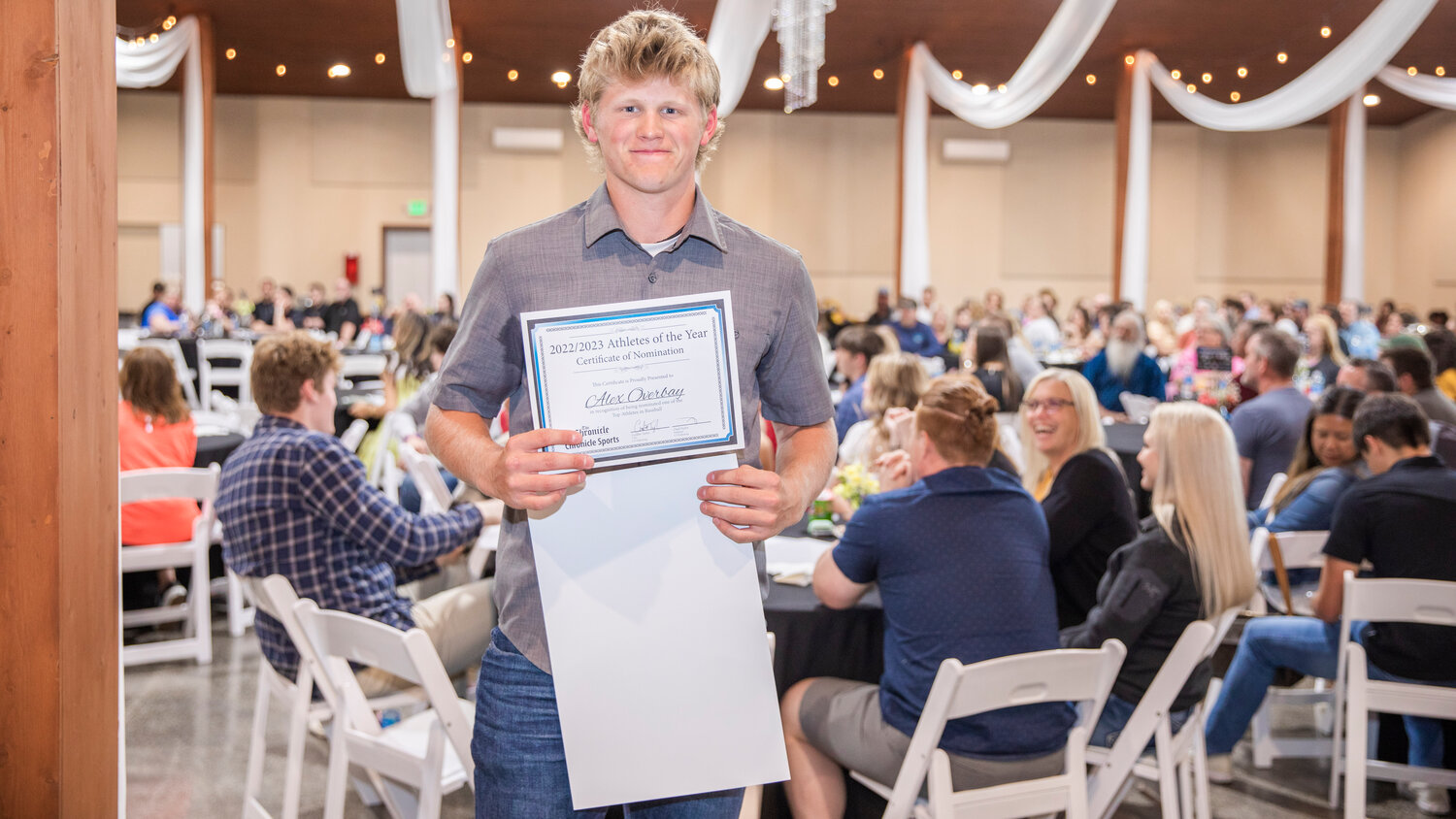 Alex Overbay smiles for a photo Tuesday evening during the “Athletes of the Year” banquet at the Jester Auto Museum. Overbay guided the T-Birds on the bump and at the plate to a regular season league title with an area high home runs and a near area high ERA on the hilt.