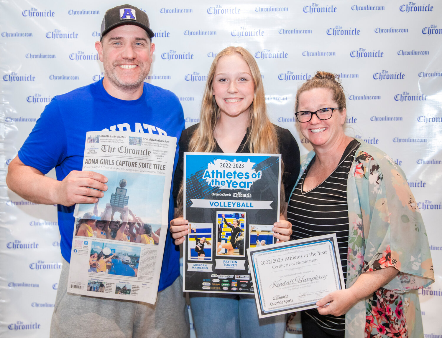 Adna’s Kendall Humphrey smiles for a photo with family Tuesday evening during the “Athletes of the Year” banquet at the Jester Auto Museum. Humphrey finished the season with 381 kills, 109 aces, and 444 digs, helping the Pirates take fifth at the 2B State tournament.