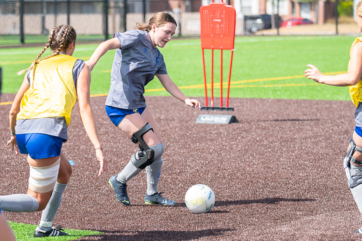 Sarah Robbins works out of pressure during a drill at the CC women's soccer team's Aug. 7 practice.