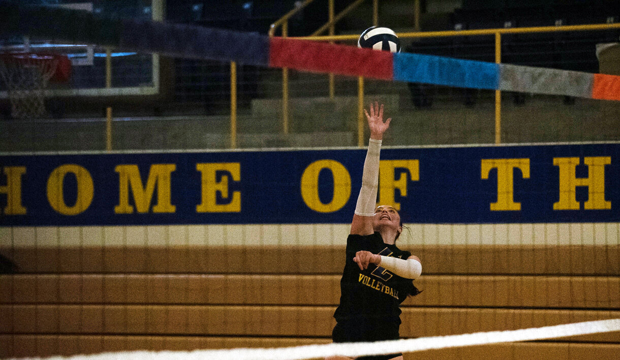 Ryli Gray taps the ball above the net during the Centralia College volleyball team's practice on Aug. 9.