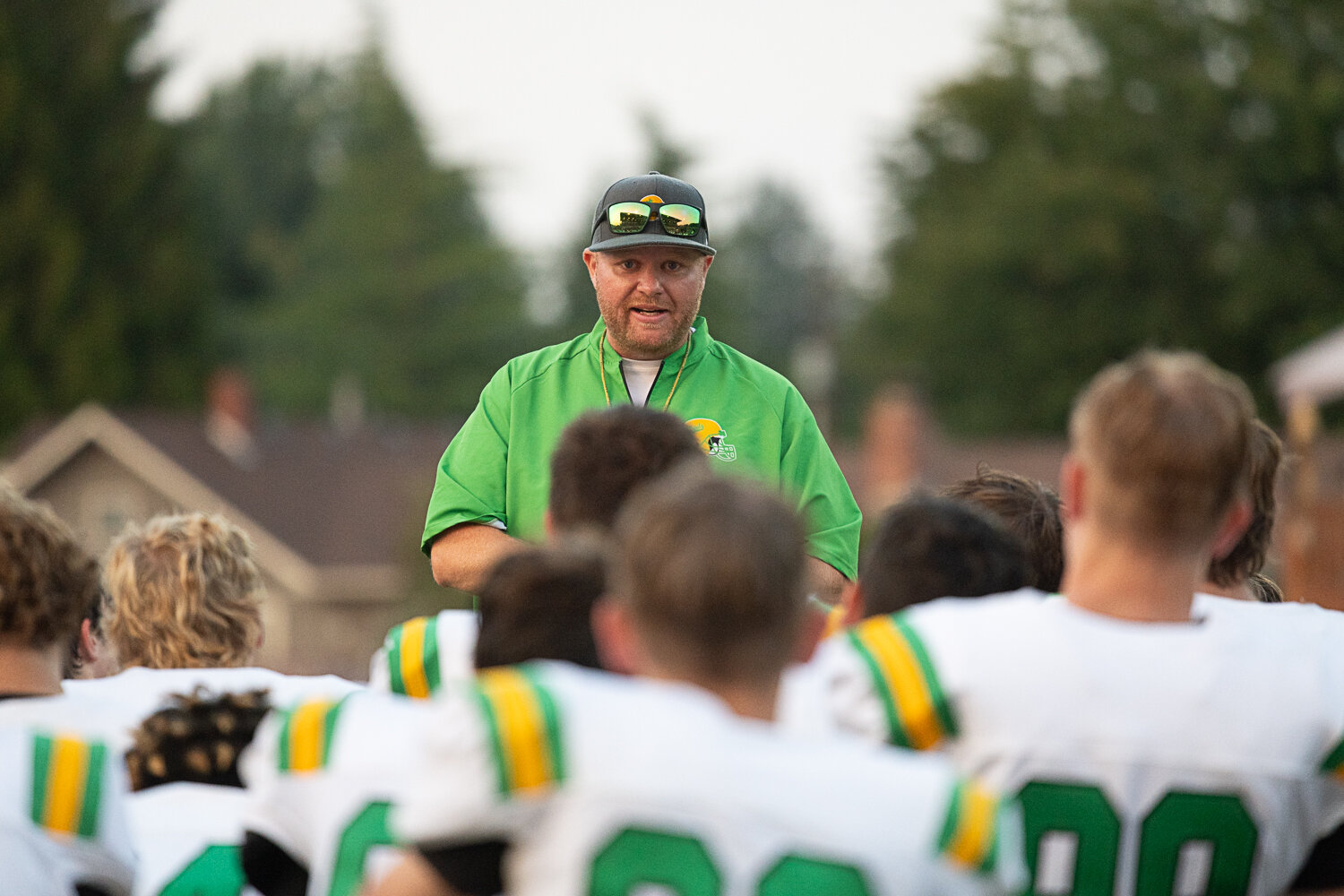 First-year coach William Garrow talks to his team after Tumwater's jamboree on Friday, Aug. 25.