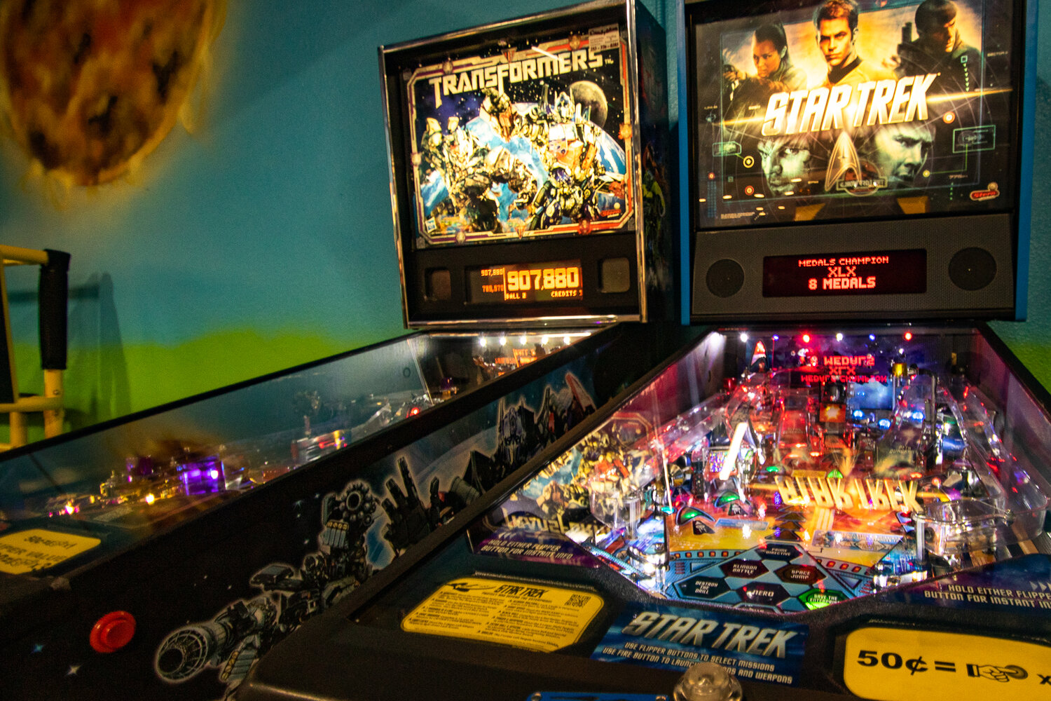 Pinball machines light up on Thursday, Aug. 31 at the newly reopened Shankz Black Light Miniature Golf location in Chehalis.