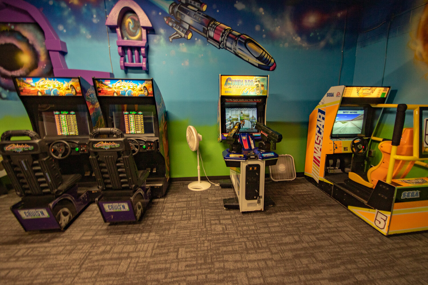 Arcade games line the wall at Shankz Black Light Miniature Golf on Thursday, Aug. 31.