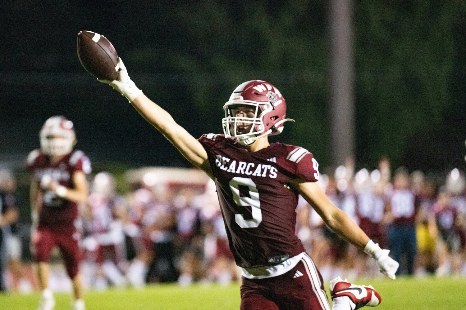 Connor Coleman celebrates his kickoff return for a touchdown during W.F. West's 27-21 loss to Ridgefield on Sept. 1.