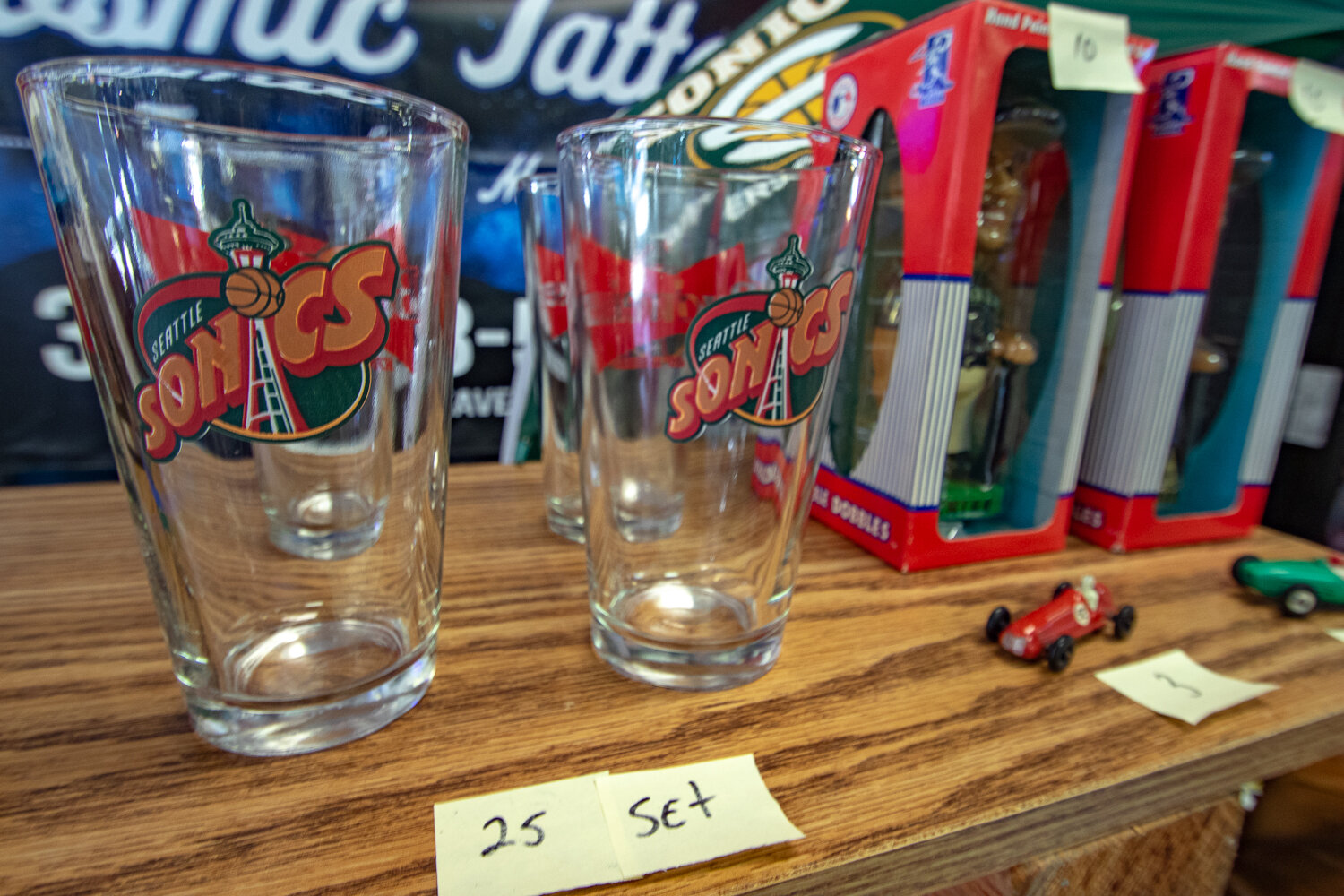 A set of Seattle Supersonics pint glasses sit on display at the Tower Mall at 320 N. Tower Ave. in Centralia during the inaugural Keiper's Cards and Memorabilia Show on Saturday, Sept. 2.