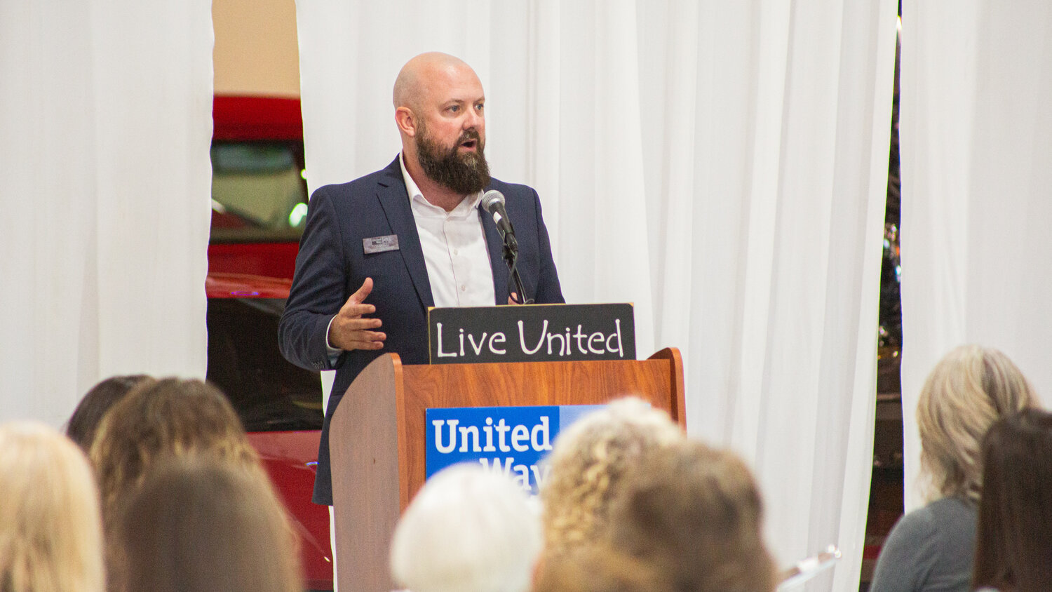 Chris Judd speaks during a United Way “Community Impact Luncheon” hosted at the Jester Auto Museum in Chehalis on Thursday, Sept. 7.