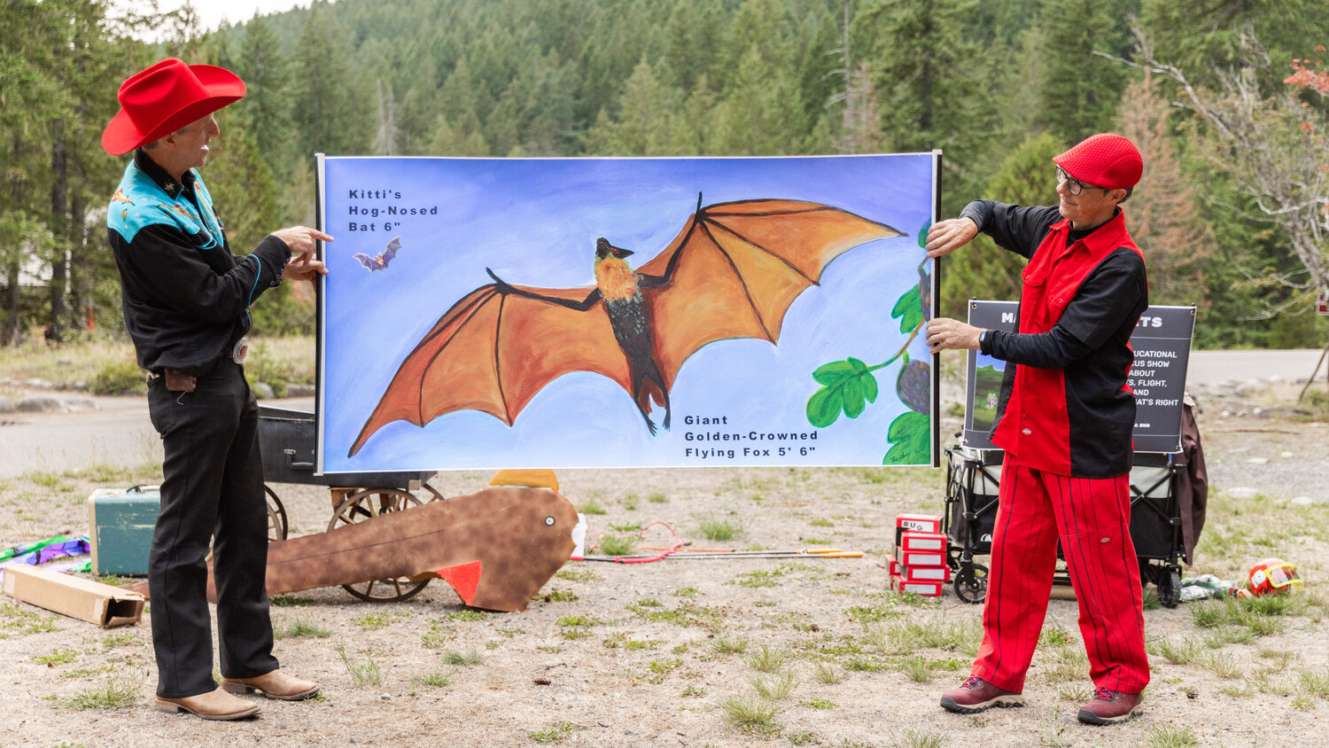 Images of the smallest and largest bats alive today are displayed during a Vaudeville-esque show about the flying mammals at Mount Rainier National Park on Tuesday, Sept. 12.
