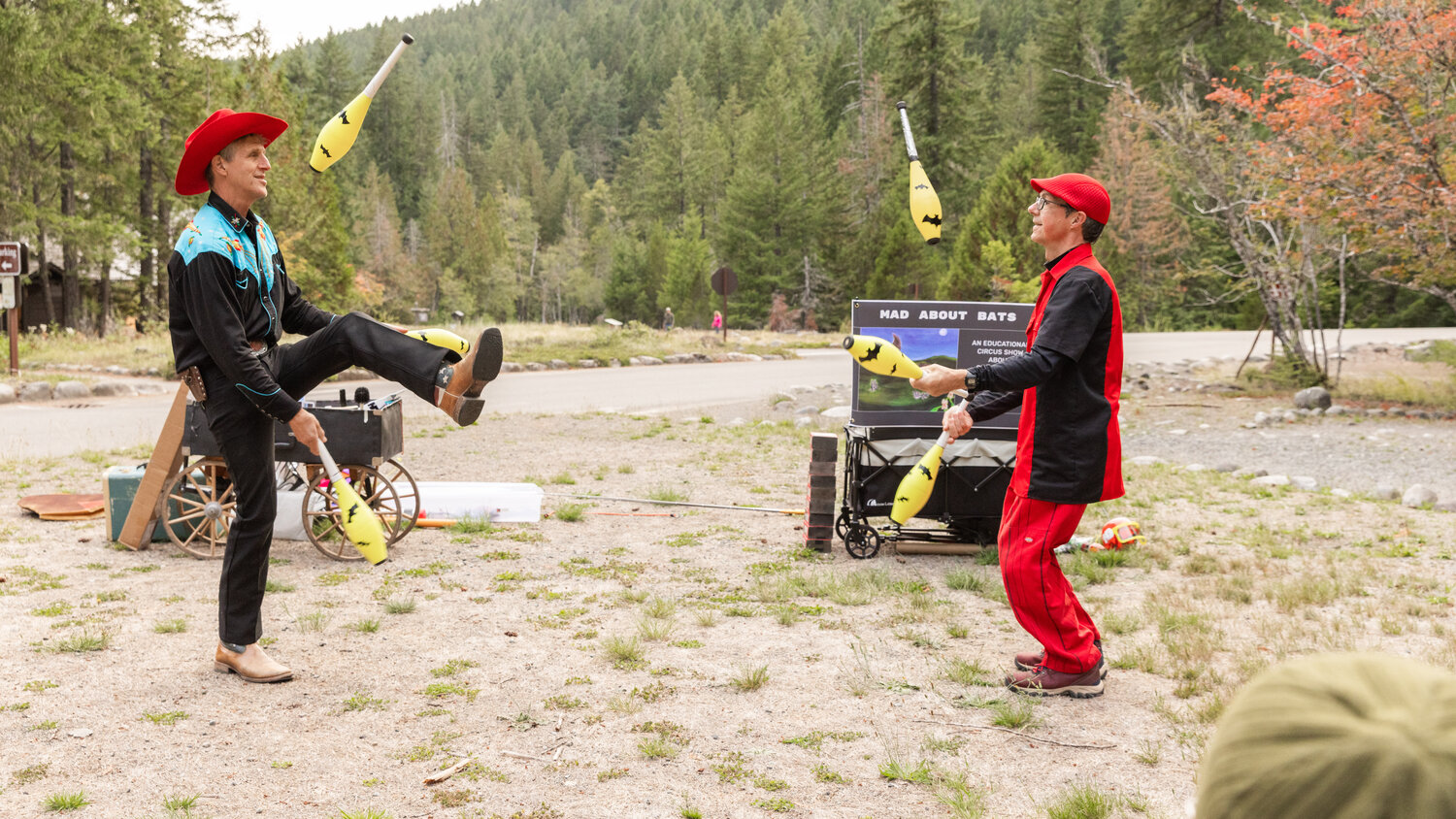 David Lichtenstein and JuggleMania’s Rhys Thomas throw bats into the air while juggling during a Vaudeville-esque show at Mount Rainier National Park on Tuesday, Sept. 12.