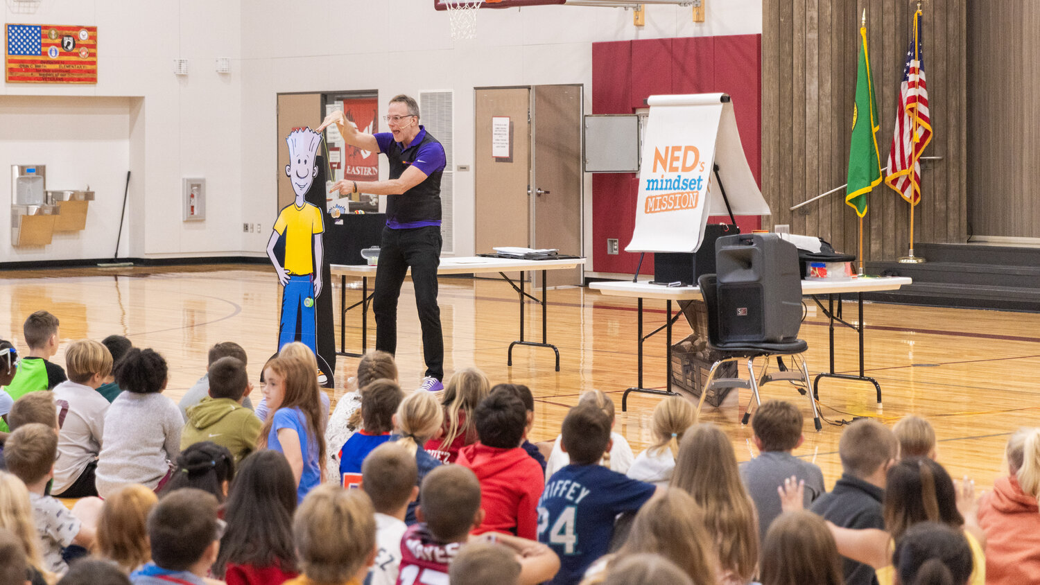 Students watch Paul, a professional yo-yo player, at Orin C. Smith Elementary School in Chehalis on Friday, Sept. 15.