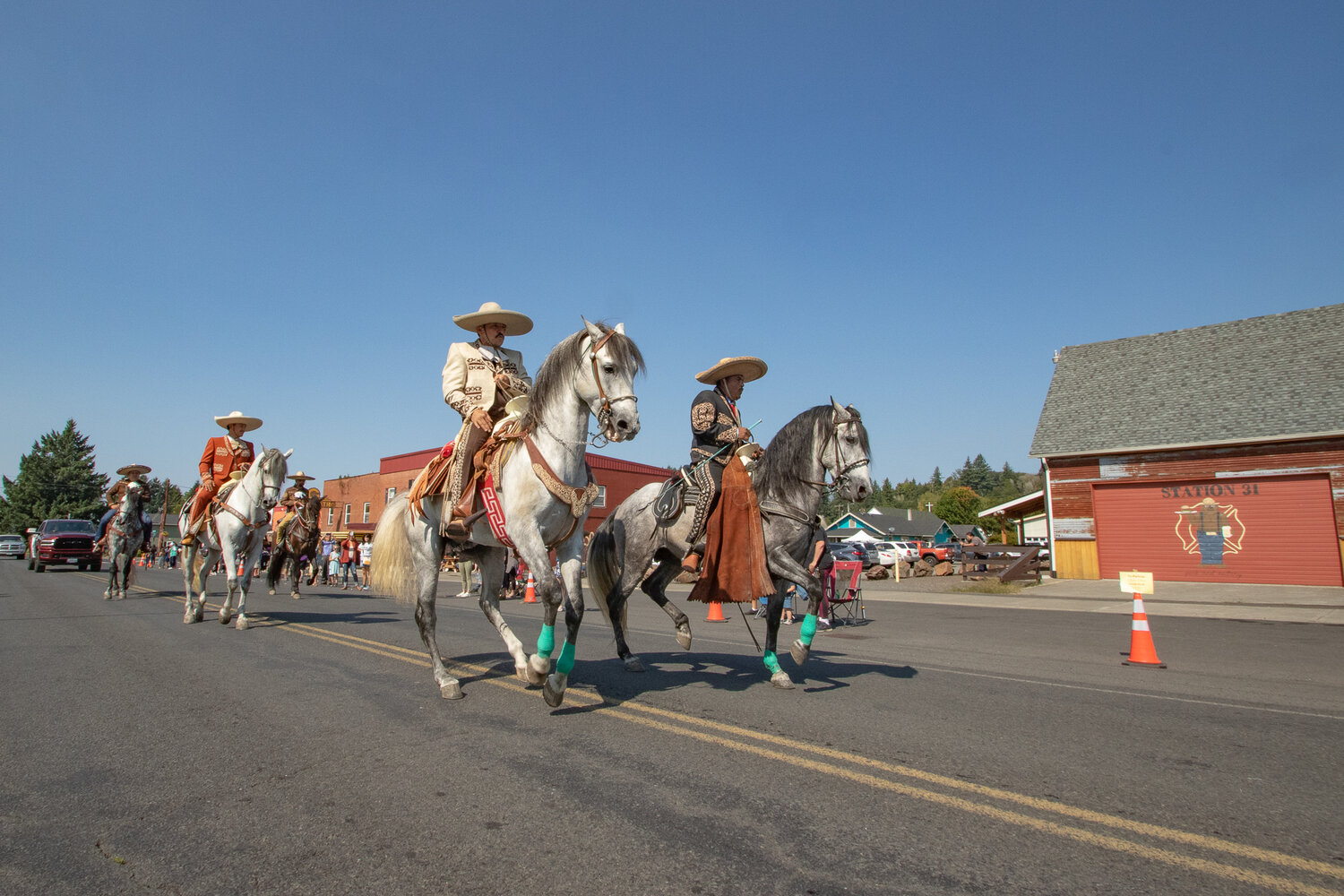 Dancing horses from Rancho MC in Kent prance their way down East State Street in Mossyrock for the Mexican Independence Day parade on Saturday, Sept. 16.