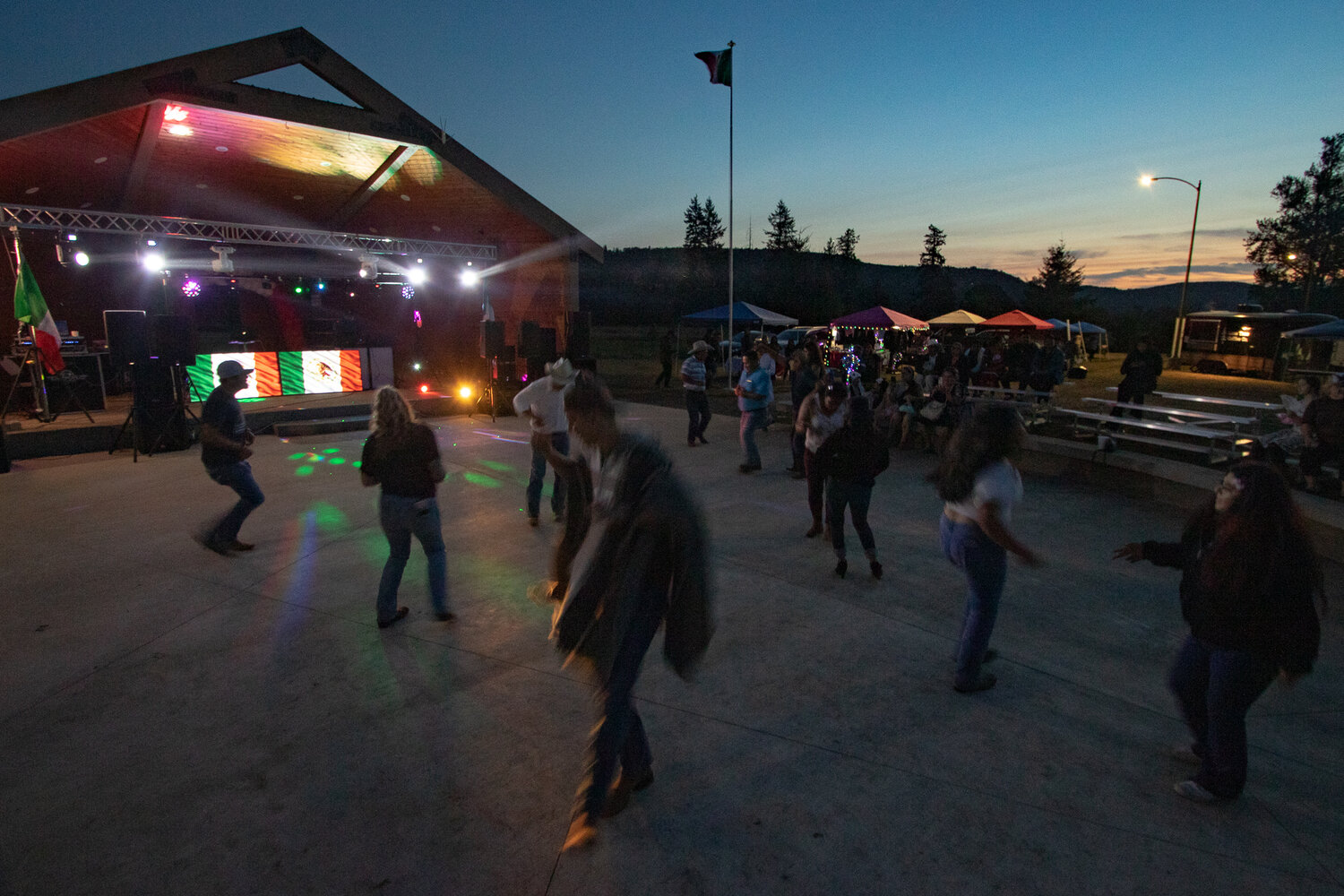Attendees dance their way into the night to the sounds of DJ Escandalo Zona Orienta at the Mexican Independence Day celebration at Klickitat Prairie Park in Mossyrock on Saturday, Sept. 16.