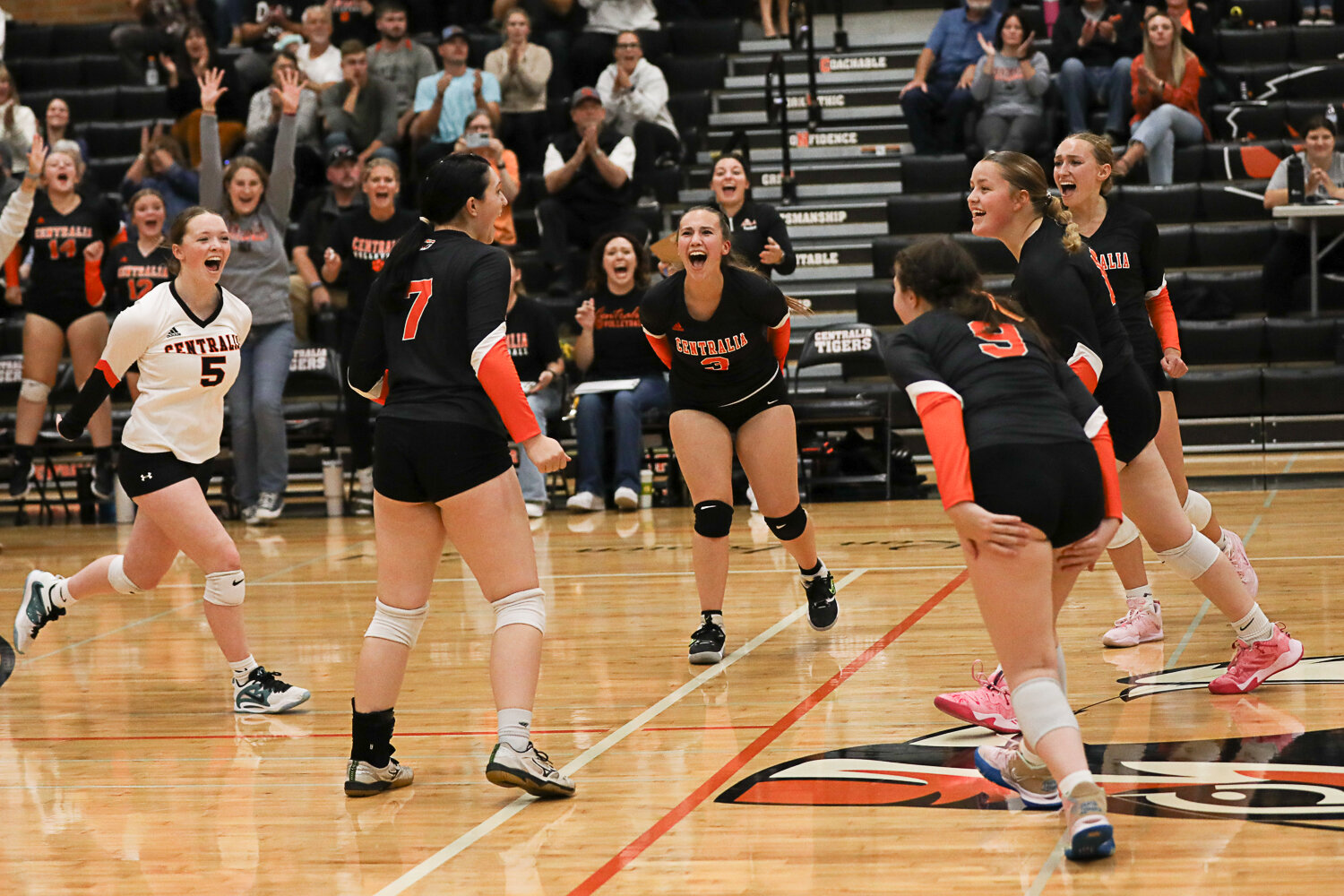 Centralia celebrates a point during the first set of its win over W.F. West on Sept. 21.
