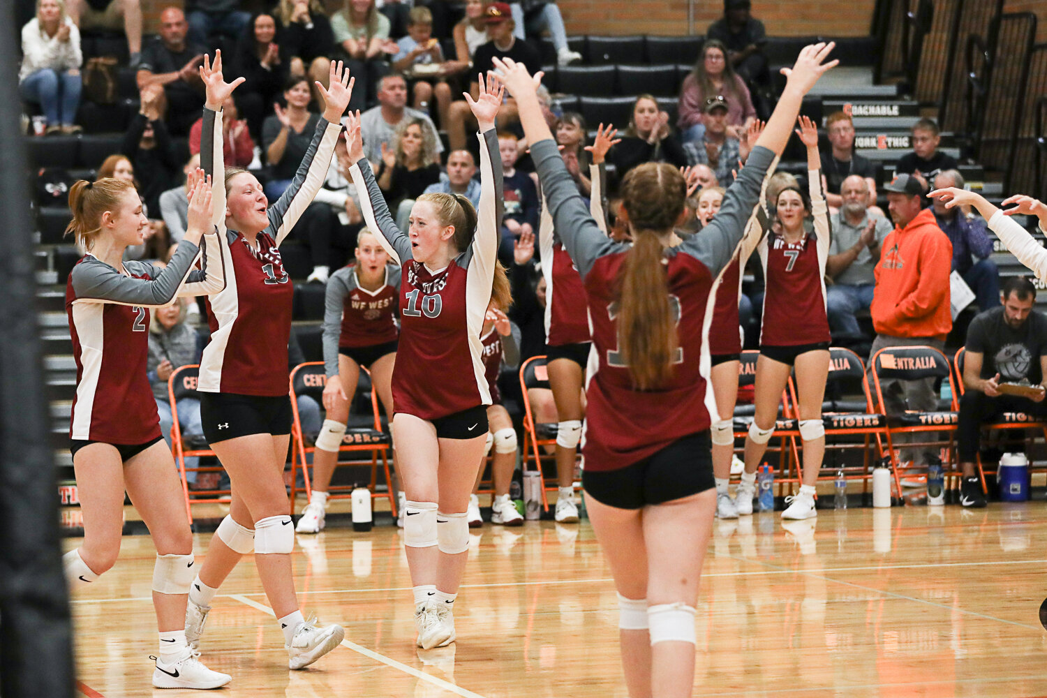 W.F. West celebrates a block during the first set of its three-set loss to Centralia on Sept. 21.