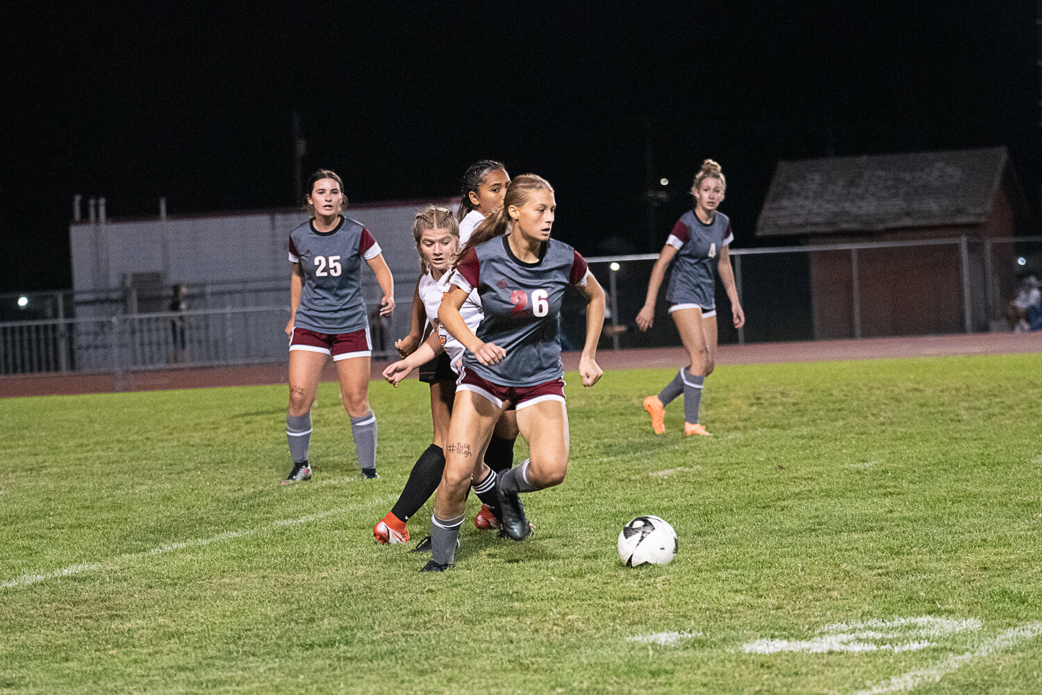 Elizabeth Mittge dribbles up field after splitting two defenders during W.F. West's loss to Centralia on Sept. 21.