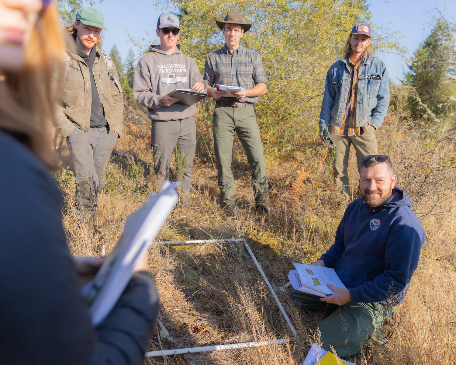 Certified Burner Program Manager Kyle Lapham, with the Department of Natural Resources, smiles during while leading a training on prescribed burning at West Rocky Prairie near Tenino on Thursday, Sept. 21.