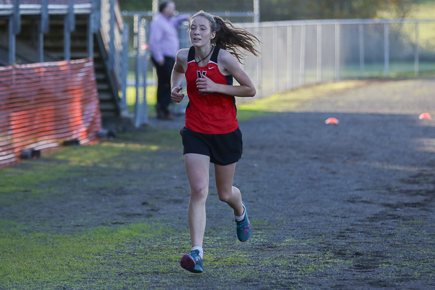 Mossyrock's Joan Wedam crosses the finish line during a meet at Toledo on Oct. 12.