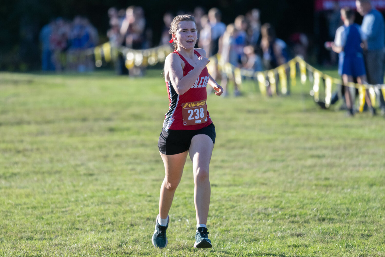 Kasey Landreau comes across the finish line at the C2BL championship meet in Onalaska on Oct. 19.