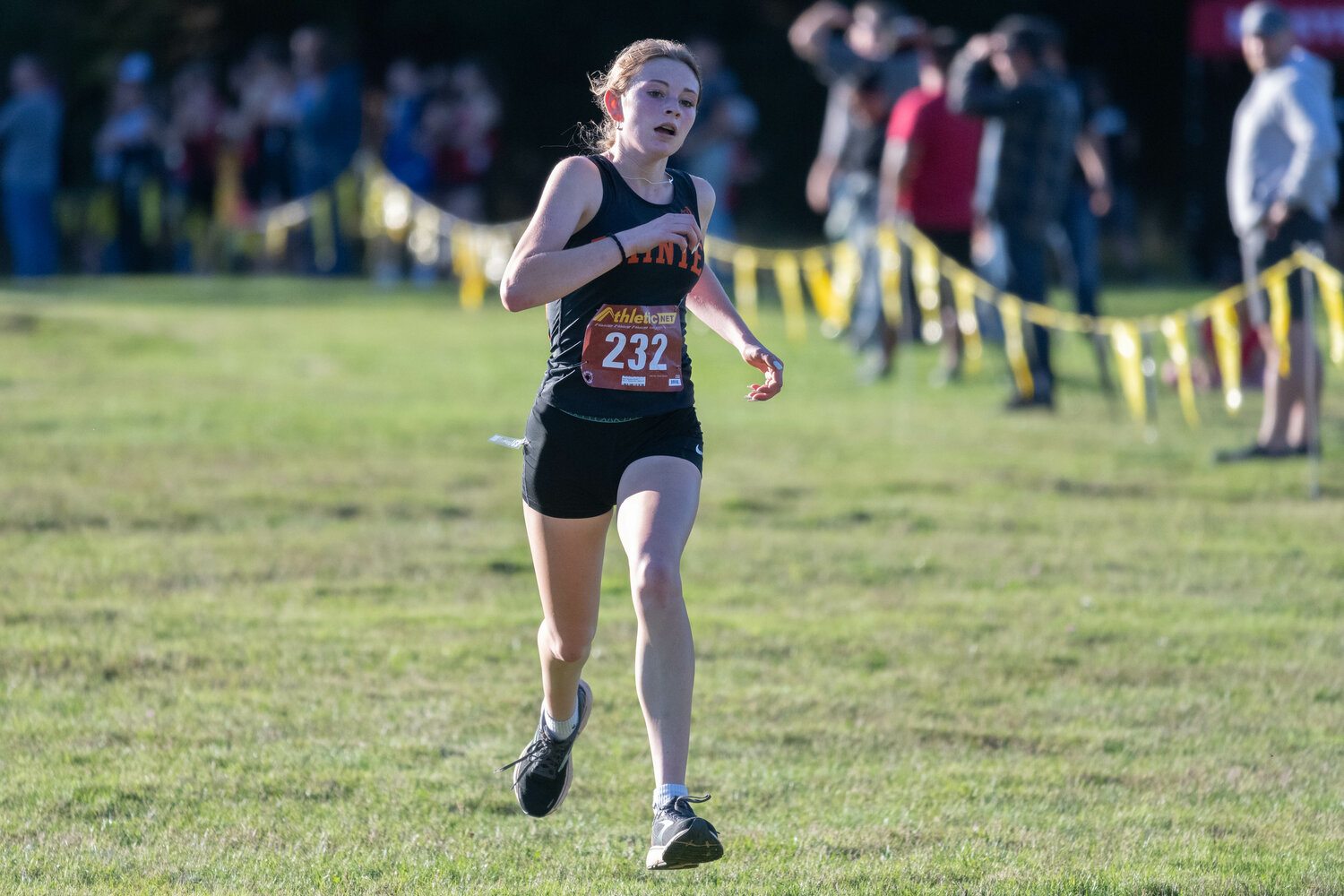 Rayanna Wisner crosses the finish line in the girls' race at the C2BL championship meet in Onalaska on Oct. 19.