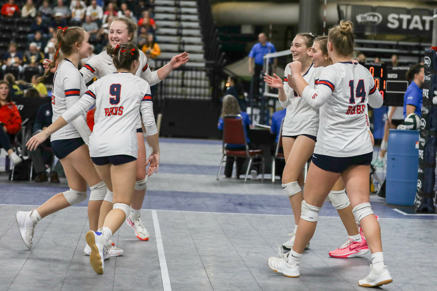 The Wolves celebrate after scoring a point during their first-round loss to White River at the state tournament on Nov. 10 in Yakima.