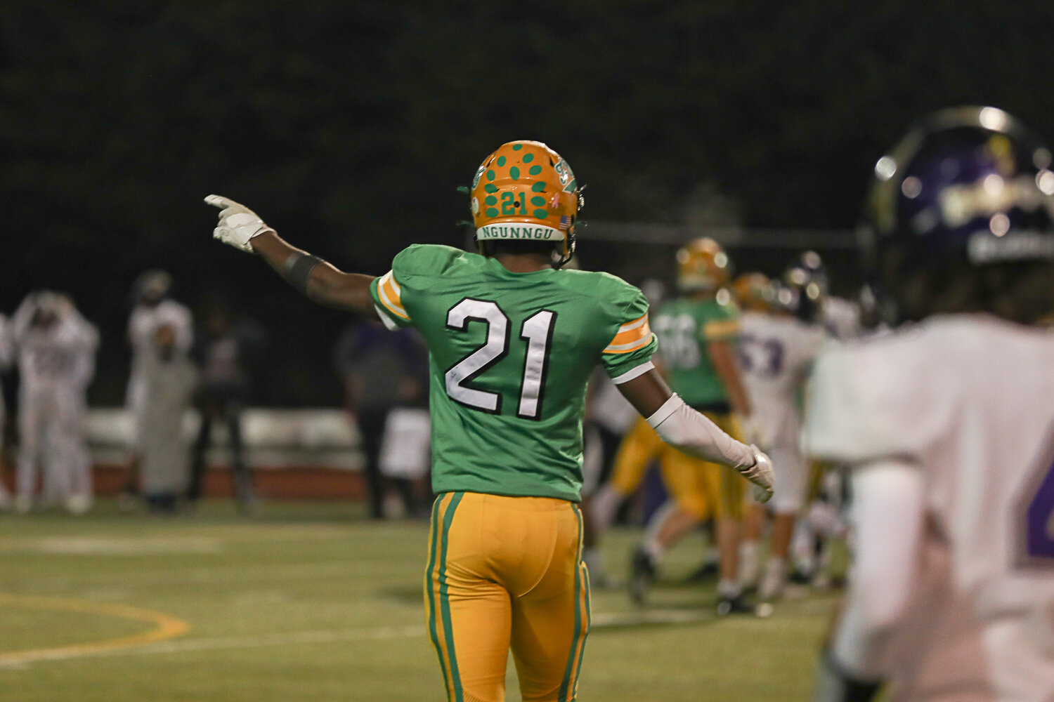 Tumwater's David Malroy signals for a first down during a 19-17 win over North Kitsap Nov. 25.