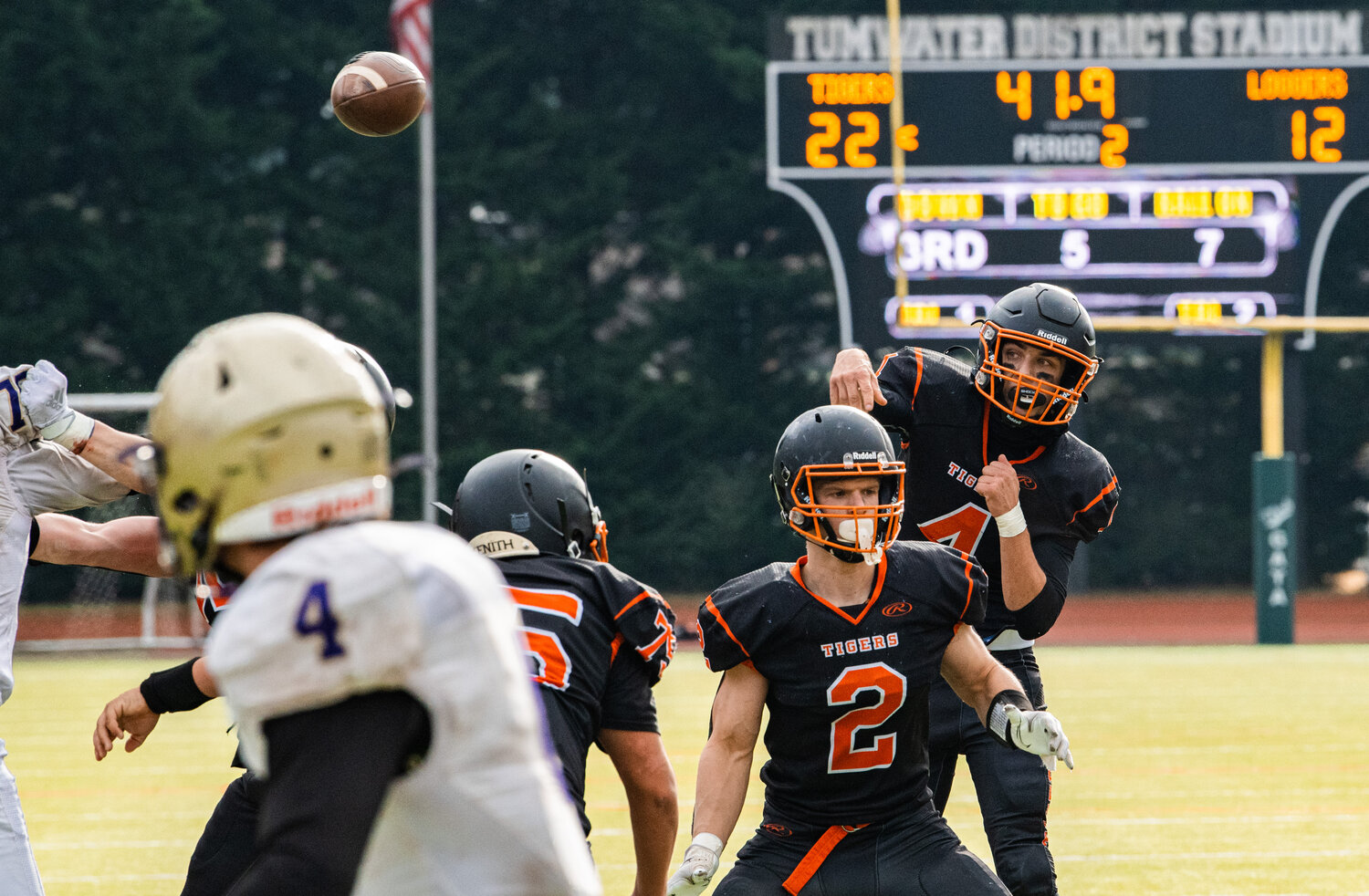 Napavine quarterback Ashton Demarest makes a throw toward the end zone during the 2B state semifinals against Onalaska in Tumwater on Saturday.
