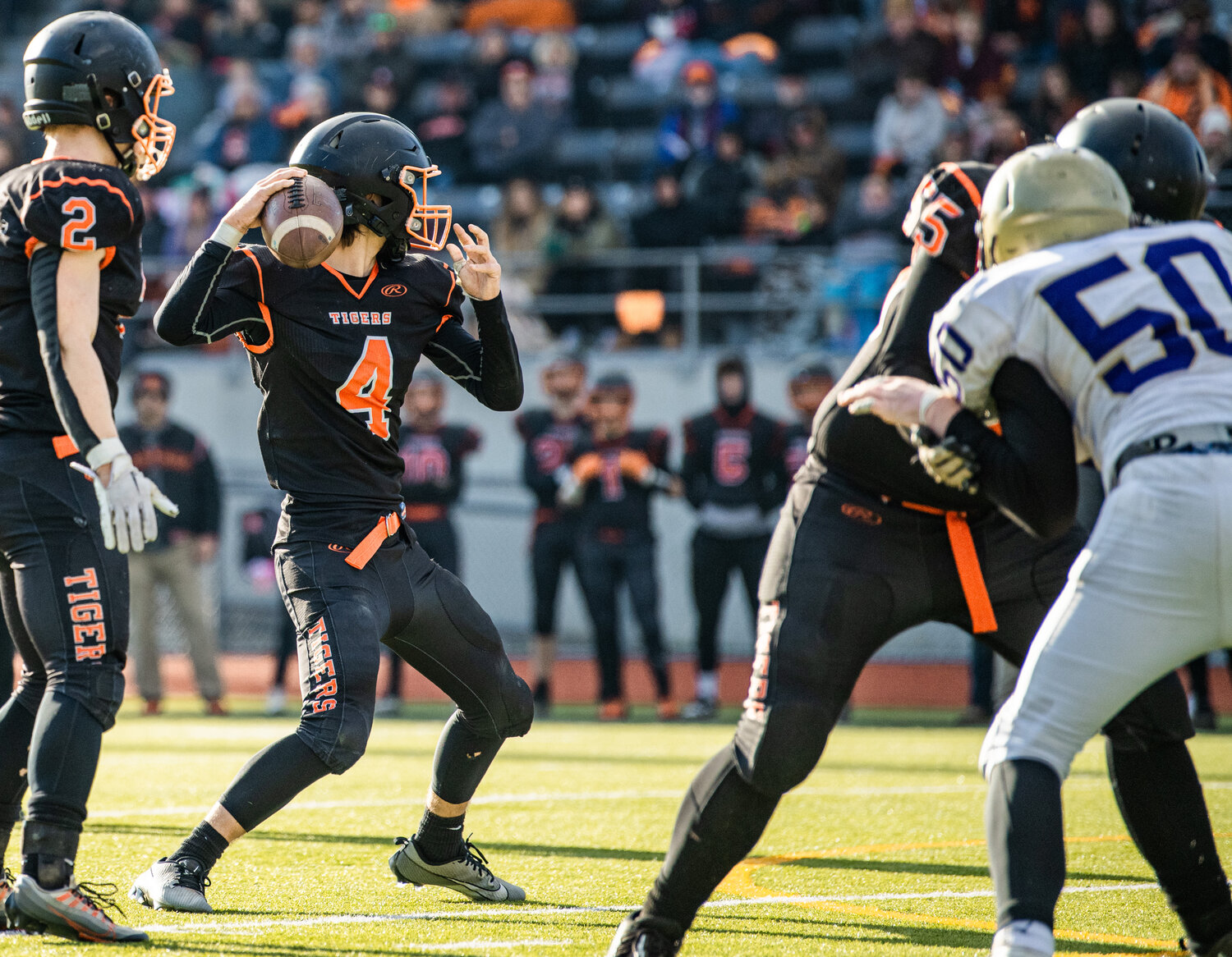 Napavine quarterback Ashton Demarest looks to throw the football during a 2B state semifinal matchup against Onalaska on Saturday in Tumwater.