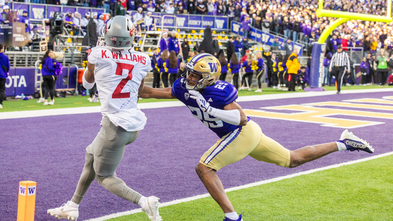 Cougars receiver Kyle Williams (2) makes a catch for a touchdown during the Boeing Apple Cup Series football game in Seattle against the University of Washington Huskies on Saturday, Nov. 25.