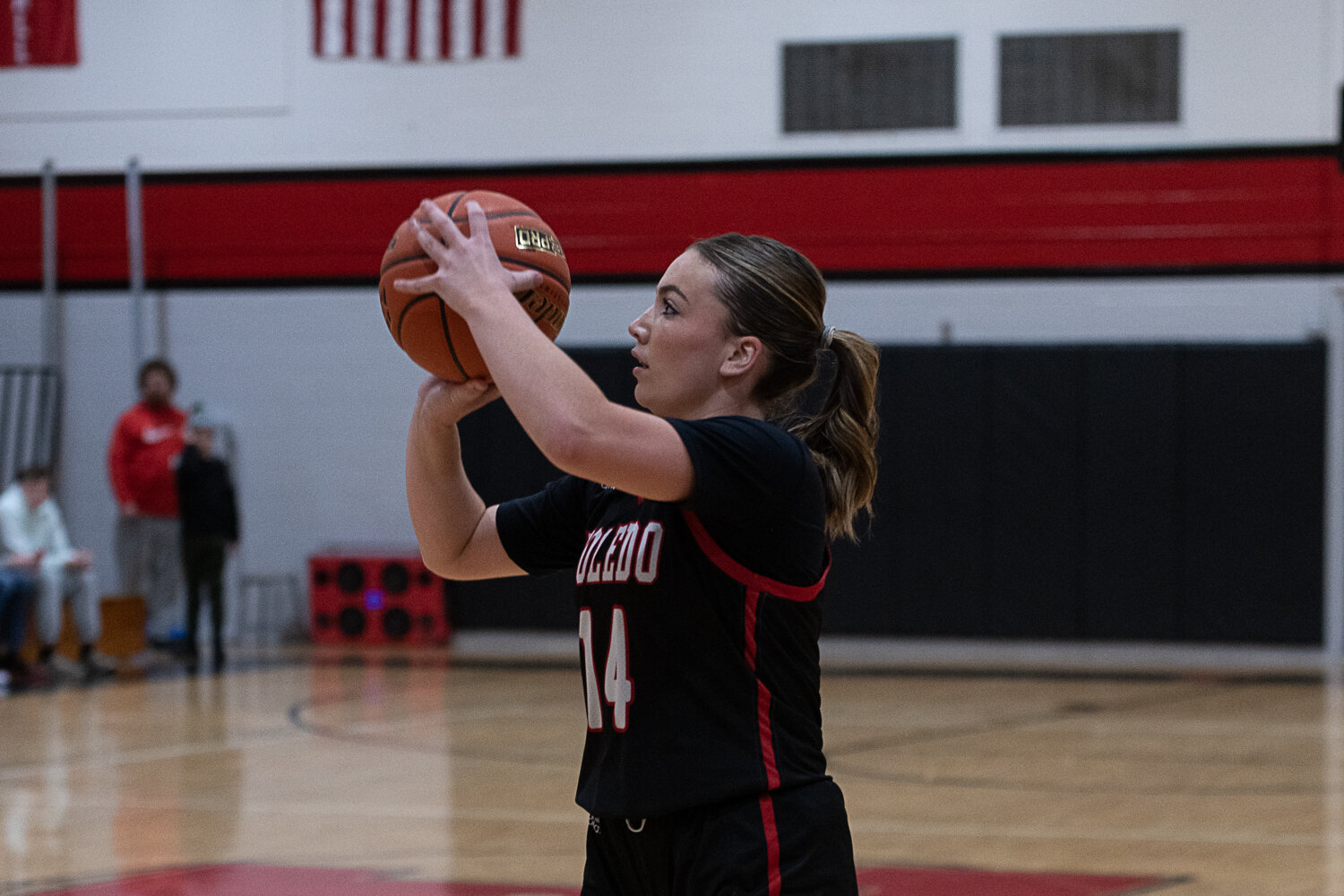 Hope Gould shoots a three during Toledo's win at Tenino on Nov. 29.