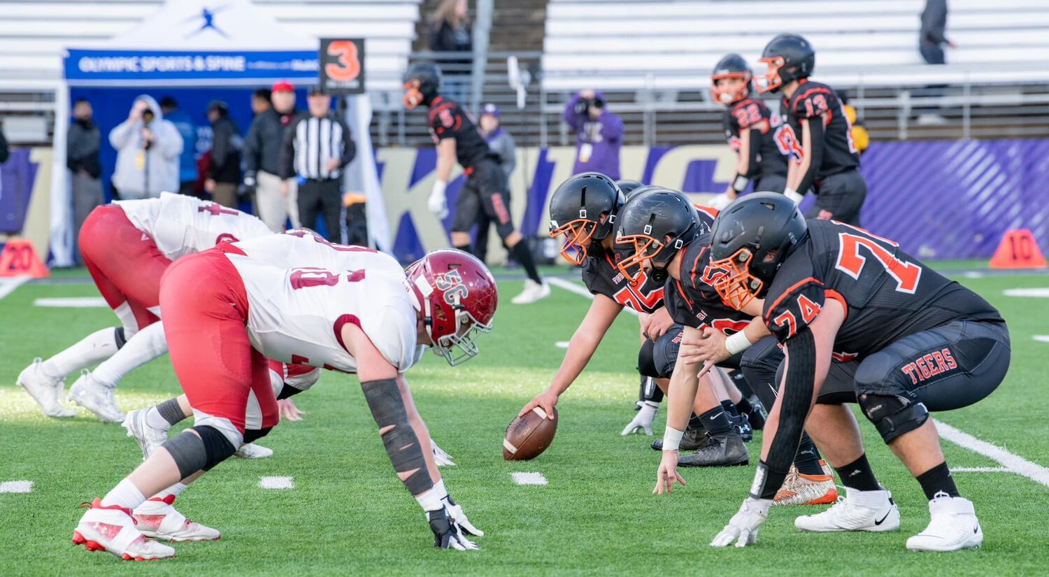 The Napavine Tigers line up against the Okanogan Bulldogs during the 2B state championship at Husky Stadium in Seattle on Dec. 2.