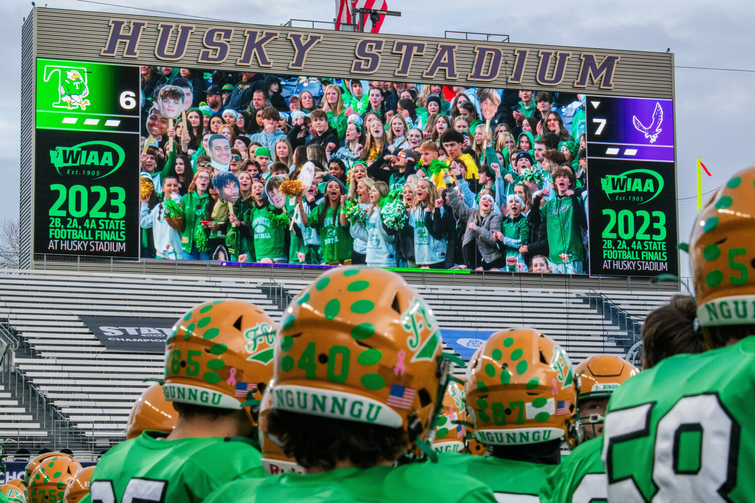 Tumwater fans cheer for the T-Birds during the 2A State Championship game at Husky Stadium in Seattle on Saturday.