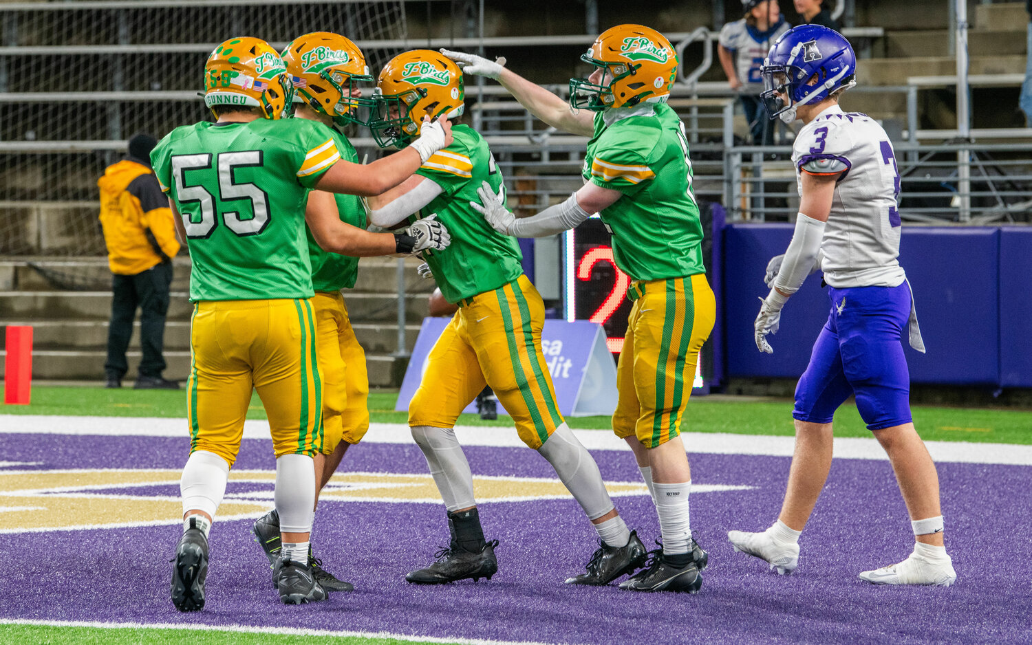 Tumwater Thunderbirds celebrate a touchdown during the 2A State Championship game at Husky Stadium in Seattle on Saturday.