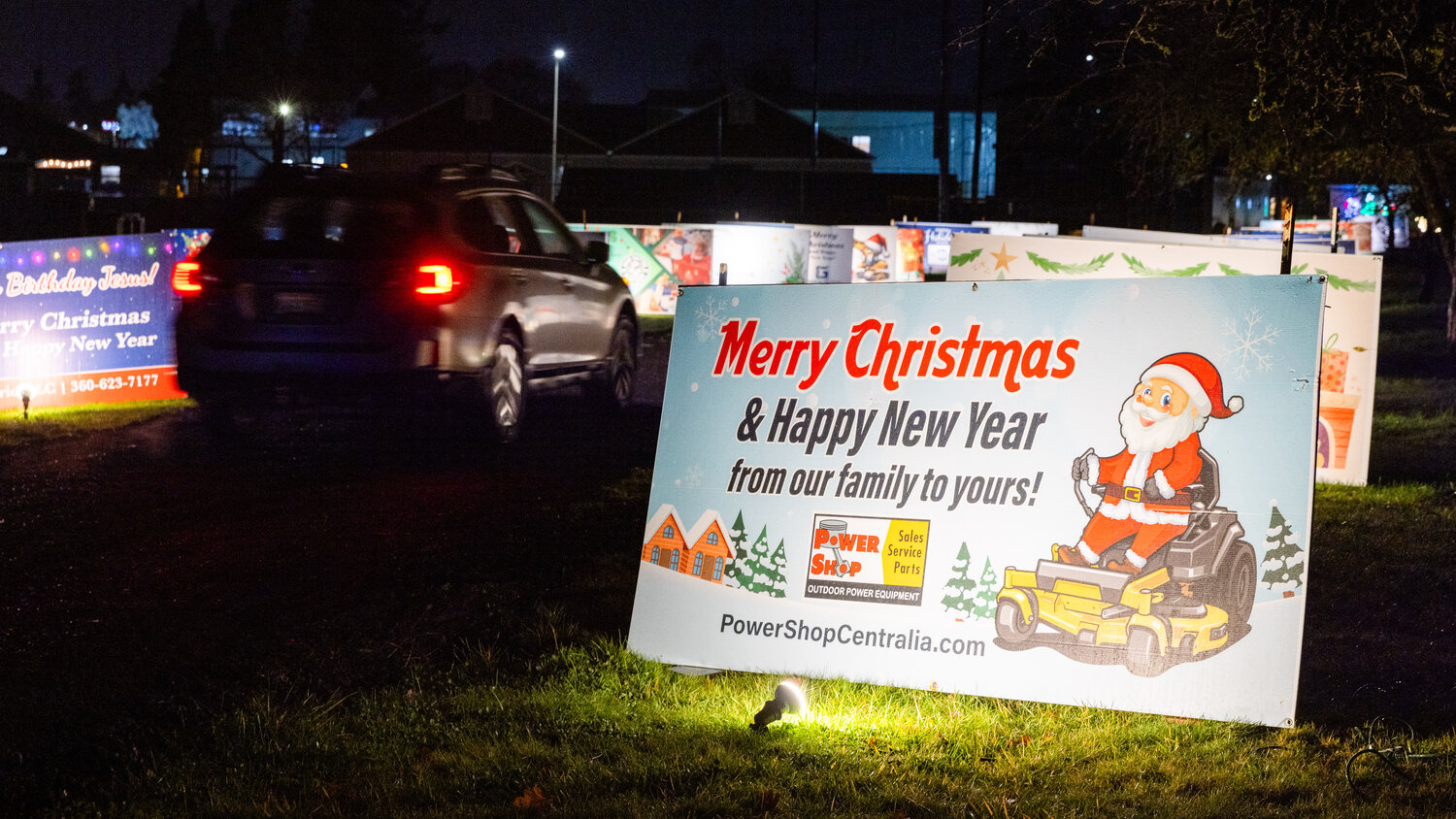Vehicles enter the Borst Park light display in Centralia on Thursday, Dec. 7.