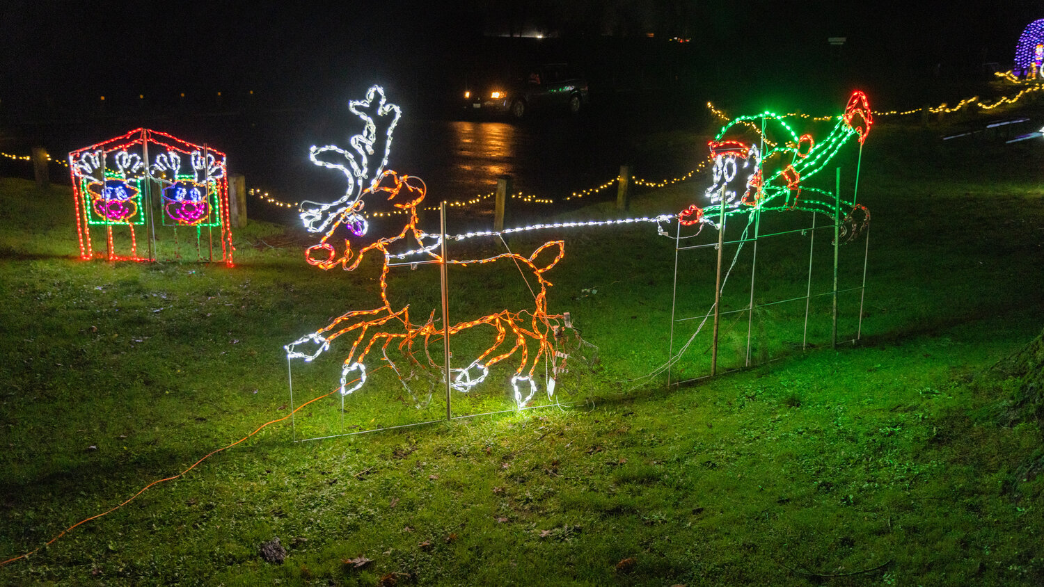 Flashing lights animate characters in Borst Park for a drive through sight seeing display in Centralia on Thursday, Dec. 7.