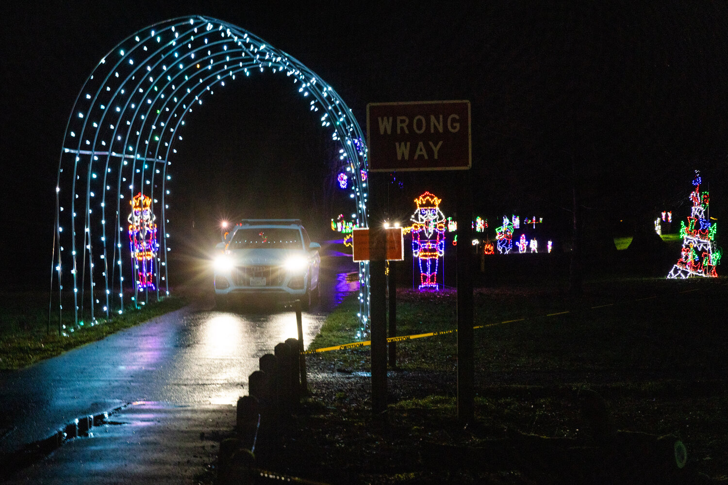 Vehicles drive through a light display at Borst Park in Centralia on Thursday, Dec. 7.