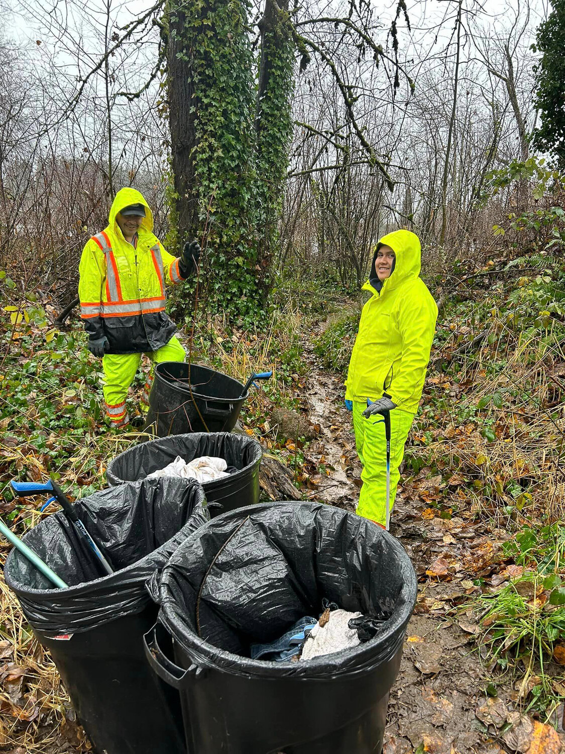 Centralia Clean Team volunteers are seen while cleaning in the woods behind Centralia Goodwill on Dec. 5 in this picture provided by Clean Team volunteer Cindy Browne.
