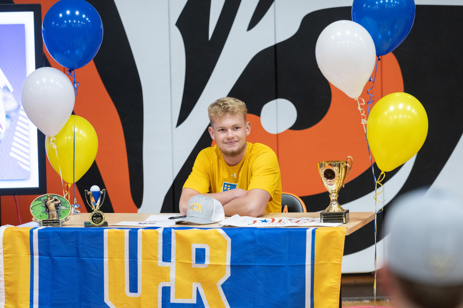 Von Wasson smiles before signing his NLI to golf at UC Riverside, on Dec. 8 at Centralia High School.