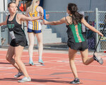 Morton-White Pass athlete Madyson Bryant takes the baton during a 2B girls relay at State track in Yakima on Saturday, May 27.
