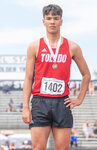 Toledo’s Jordan McKenzie poses with his bronze medal for the boys 400 meter dash at the State track and field meet in Yakima on Saturday.
